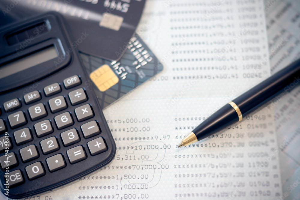 Book bank, credit cards, the calculator, a ball pen. Book bank, credit cards, the calculator, a ball pen.