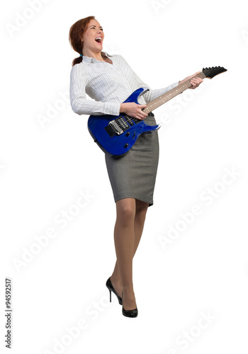 Businesswoman with guitar
