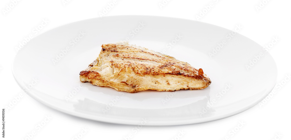 Test roasted fish fillet on plate isolated on white
