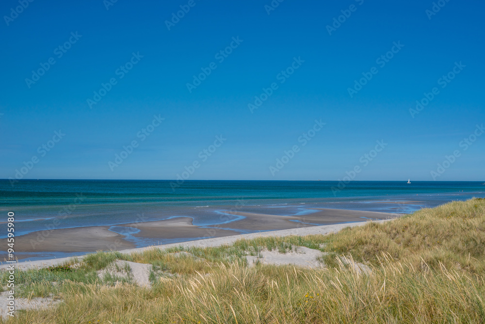 Beach with low tide water Beach with low tide water