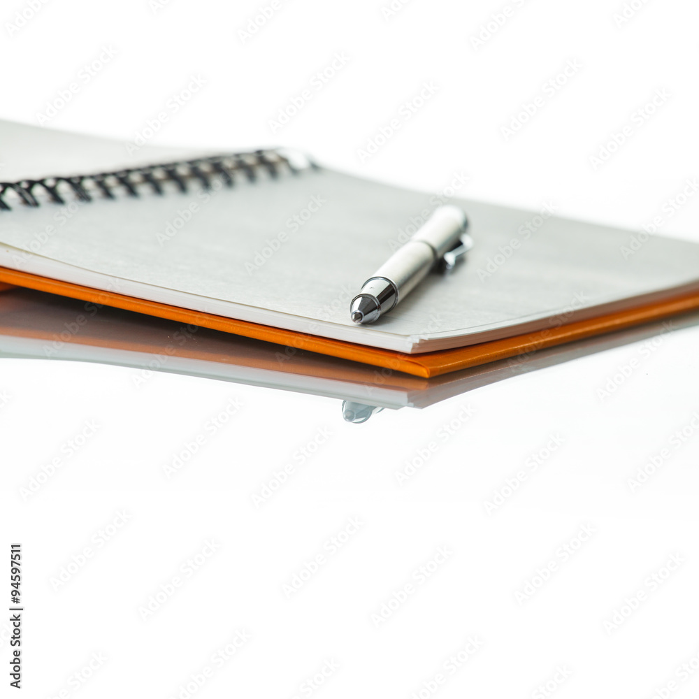 Naklejka premium Notebook and pen