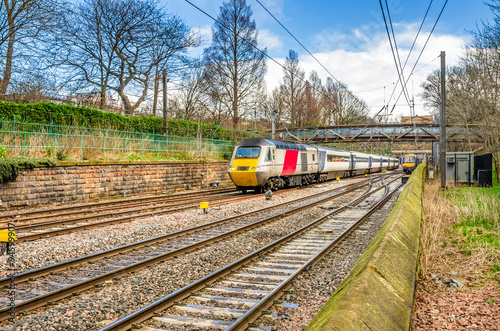 Electric Passenger Train on a Cloudy Winter Day