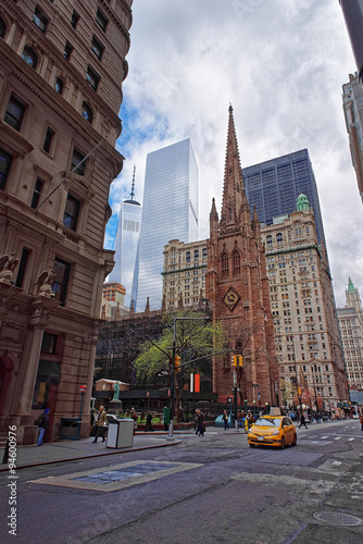 Trinity Church at the intersection of Wall street and Broadway photo