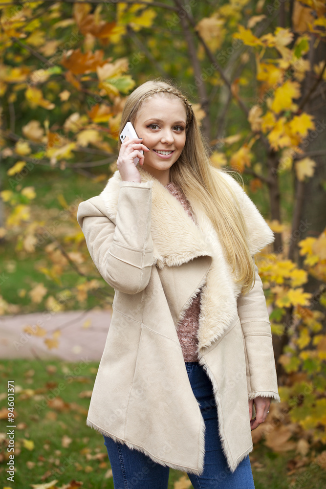 Portrait of a beautiful young woman calling by phone Portrait of a beautiful young woman calling by phone