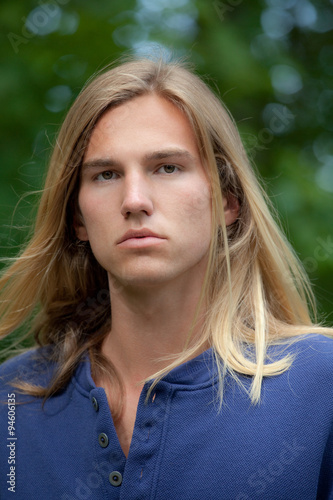 Handsome Young Man With Long Hair