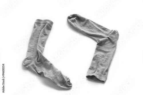 Clean laundered men's socks on a white background