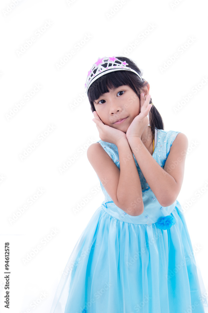 Cute Asian little princess girl in silver crown and blue dress o Cute Asian little princess girl in silver crown and blue dress o