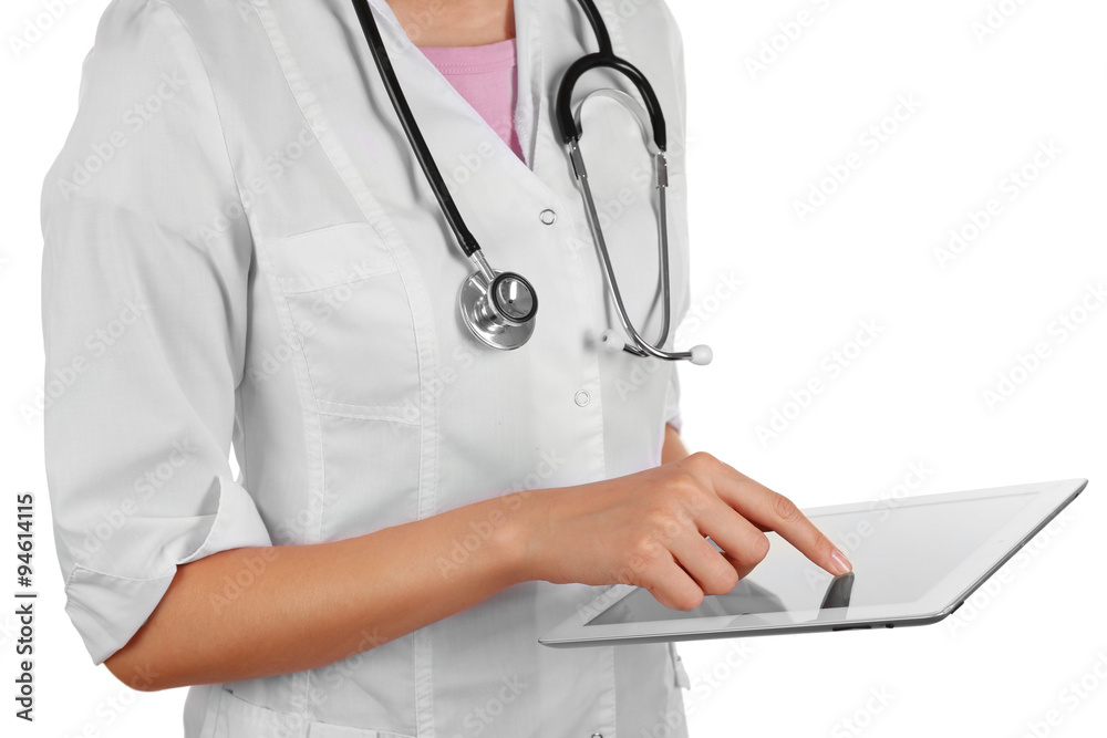 Female doctor working on digital tablet isolated on white Female doctor working on digital tablet isolated on white