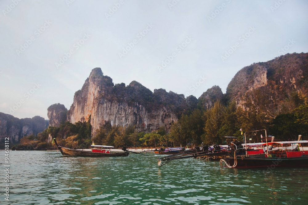 beautiful beach in Thailand with traditional boats, Krabi