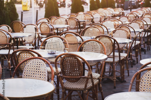 tables and chairs of street cafe