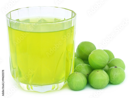 Herbal amla juice with fresh fruits photo