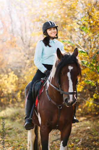 Happy woman on horseback 