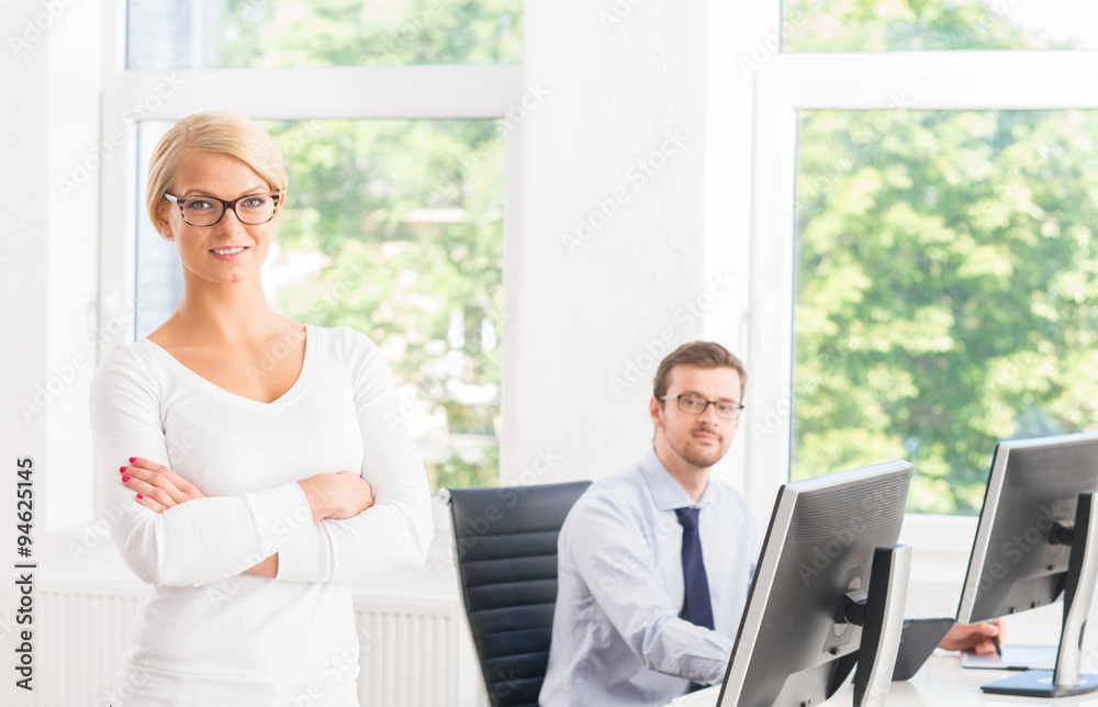 Beautiful female ceo keeping everything under control in the office Beautiful female ceo keeping everything under control in the office