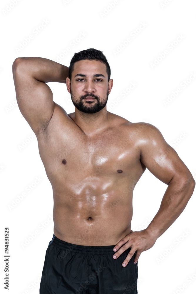 Fototapeta premium Muscular man flexing for camera