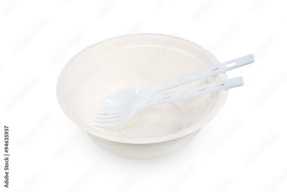 Paper food container with plastic spoon and fork on white backgr