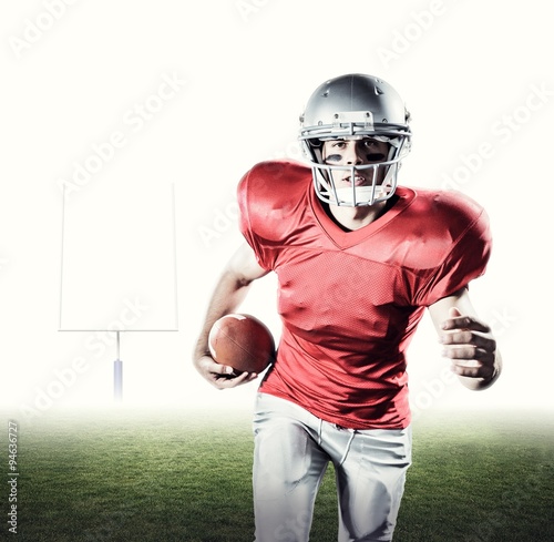 Composite image of portrait of football player running