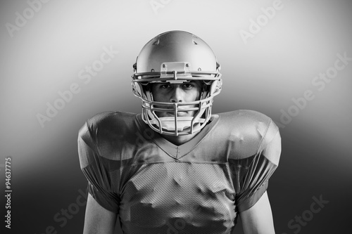 Portrait of sportsman playing American football