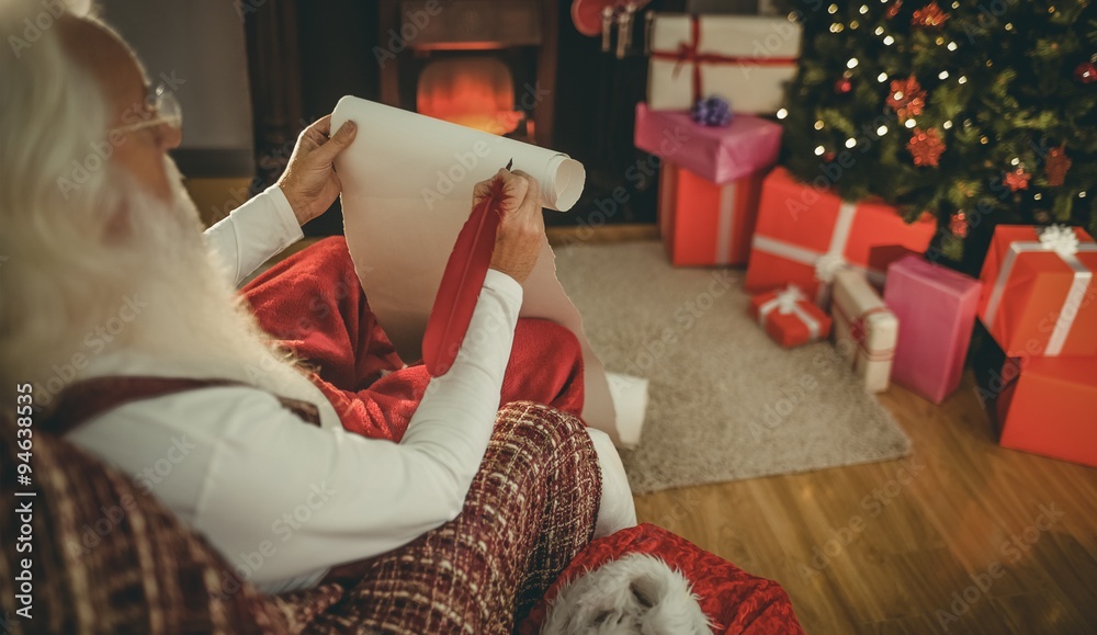Santa claus holding his list Santa claus holding his list
