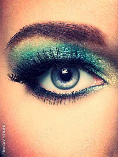Woman's eye with green eye make-up. Long eyelashes © Valua Vitaly