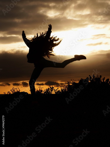 girl jumping silhouette