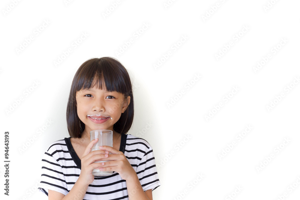 Gorgeous little girl wearing striped encouraged to drink milk Gorgeous little girl wearing striped encouraged to drink milk