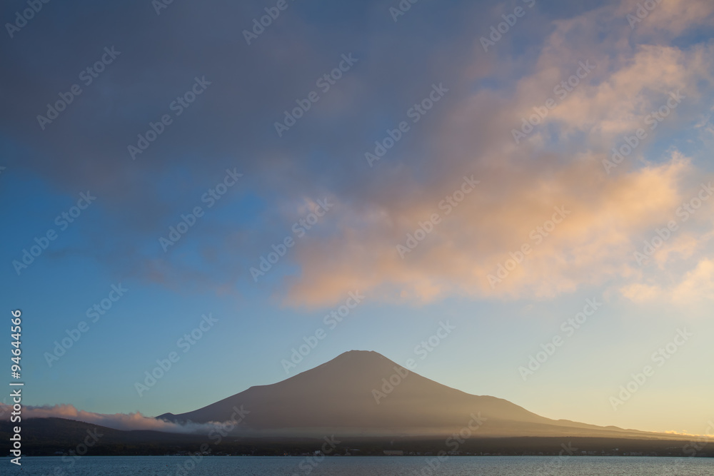 Mountain Fuji and cloud with beautiful sunset sky at lake Yamanakako in summer evening