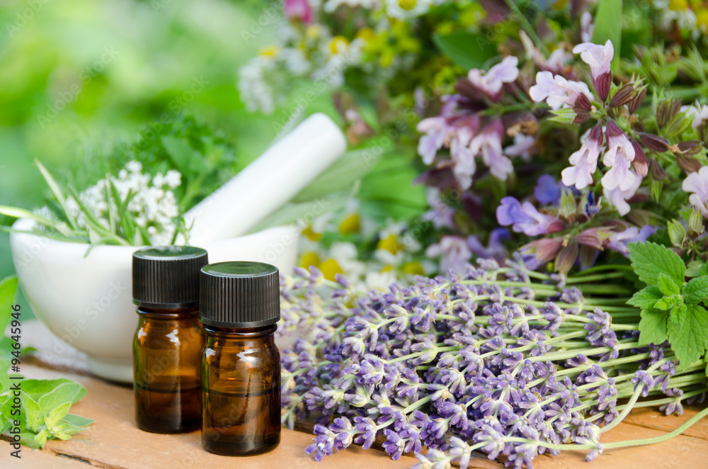 essential oils with herbal flowers for aromatherapy treatment - obrazy, fototapety, plakaty 