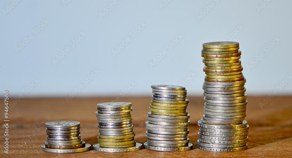 Saving Concept.Growth Stacked Coins. Saving Concept.Growth Stacked Coins.