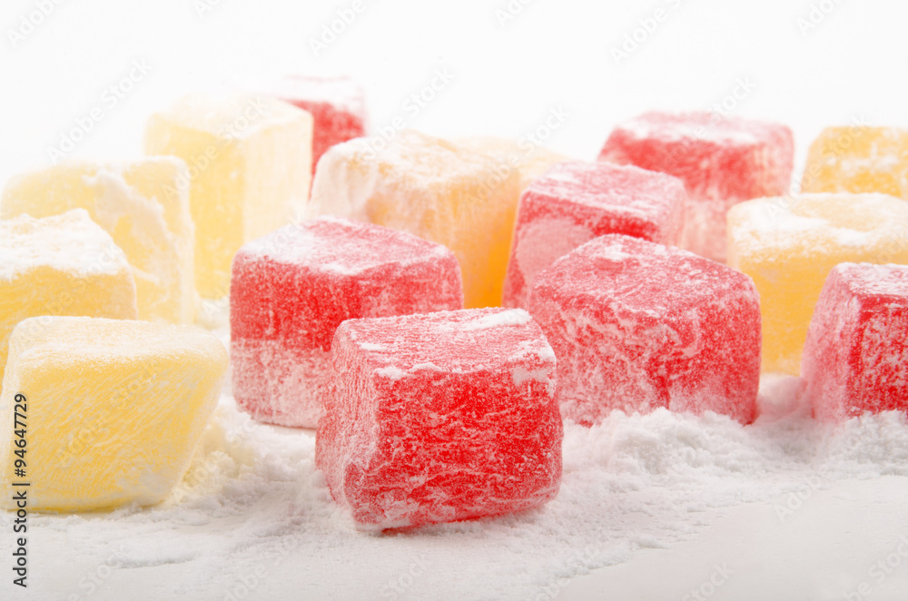 sweet pieces of turkish delight with powdered sugar sweet pieces of turkish delight with powdered sugar