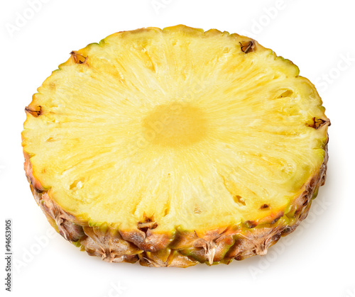 Fresh cut pineapple. Round slice isolated on white background.