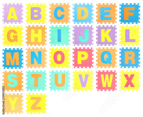 Jigsaw set with alphabet on white background