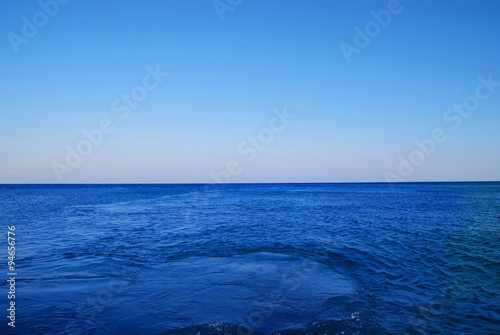 Fototapeta Naklejka Na Ścianę i Meble -  Mediterranean Sea Background. Blue Water. Waves on the Surface.