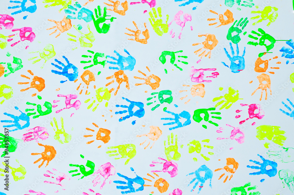 colorful hand prints on a wall