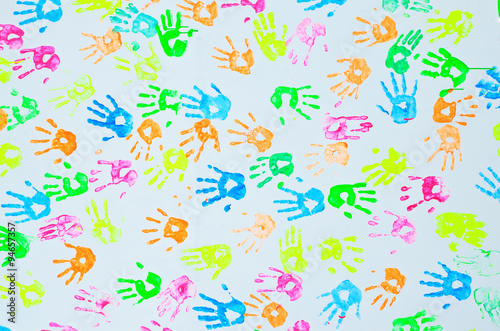 colorful hand prints on a wall