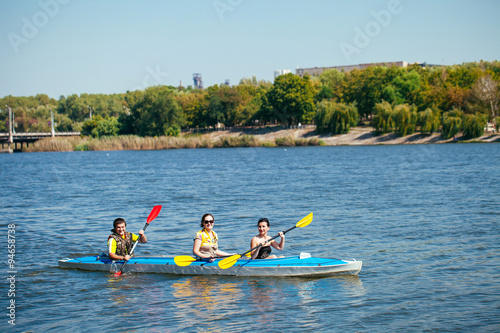 People of all ages in a kayak. Family holiday.