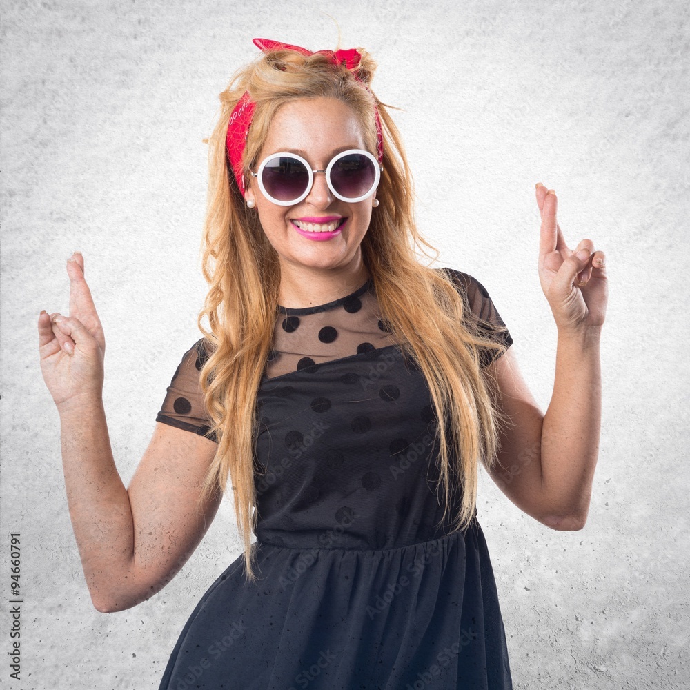 Pin-up girl with her fingers crossing Pin-up girl with her fingers crossing