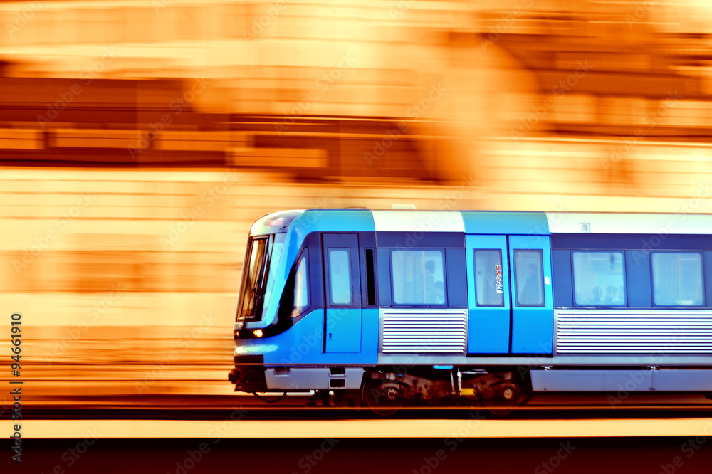 Fototapeta premium Panning blurred train on bridge