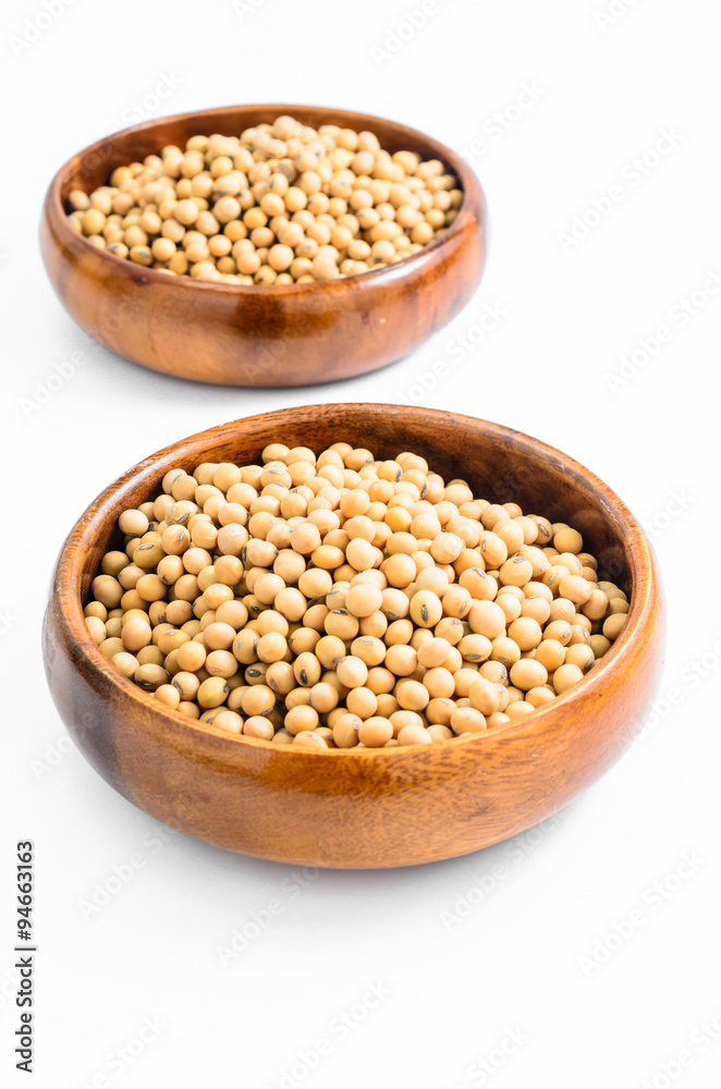 soybeans in wooden bowl isolated on white background.. soybeans in wooden bowl isolated on white background..