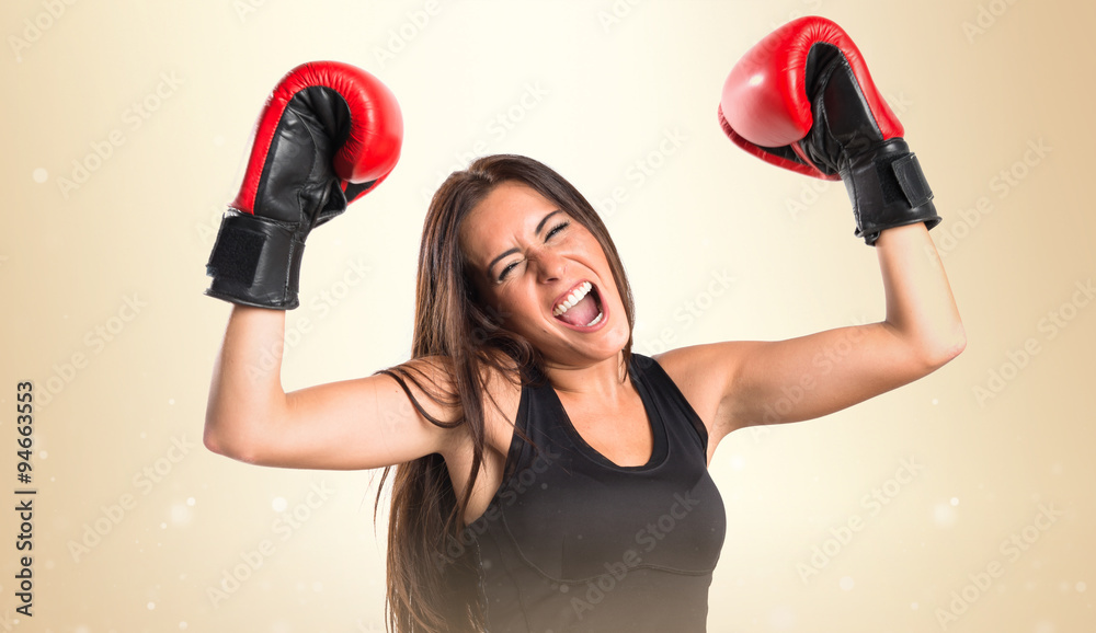 Lucky woman with boxing gloves Lucky woman with boxing gloves