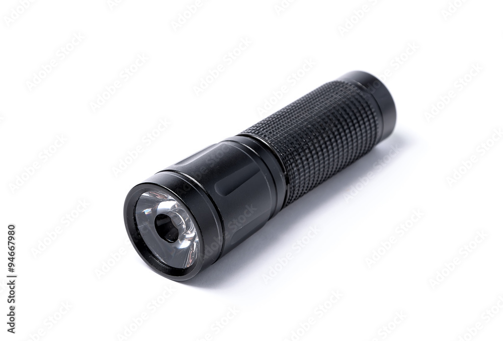 Close up shot flashlight on isolate white background Close up shot flashlight on isolate white background