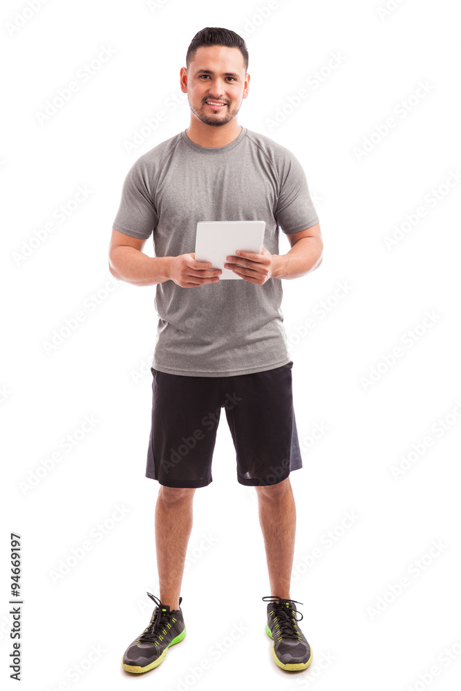 Athlete using a tablet computer Athlete using a tablet computer