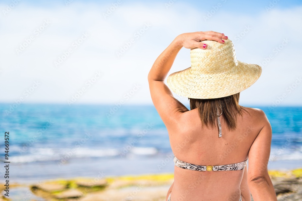 woman in bikini in back position
