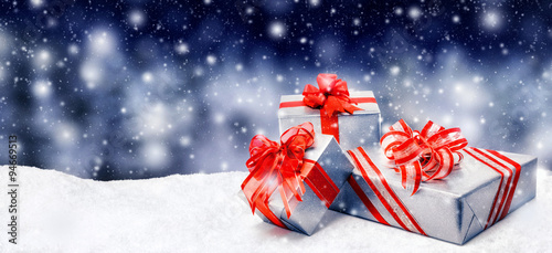 Christmas presents in snow photo