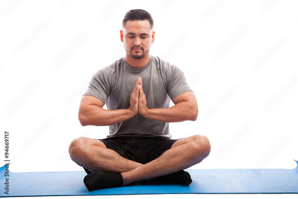 Young man doing some yoga