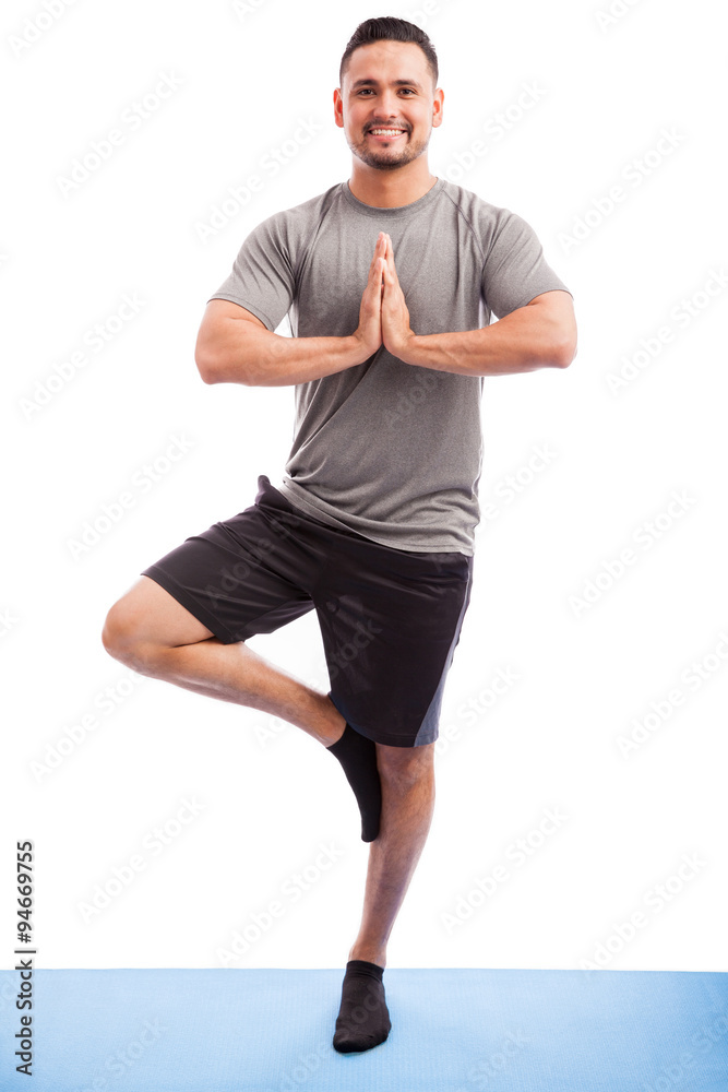 Young man enjoying yoga practice