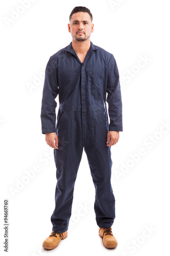 Young man wearing overalls photo