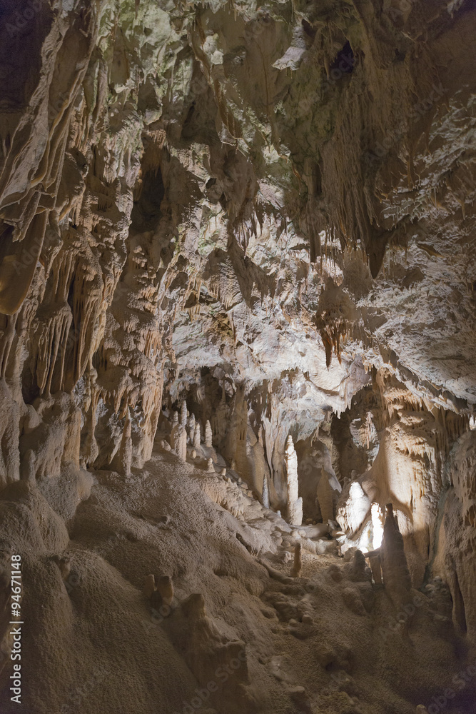 Cave inside with stalactites and stalagmites