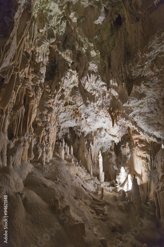 Cave inside with stalactites and stalagmites