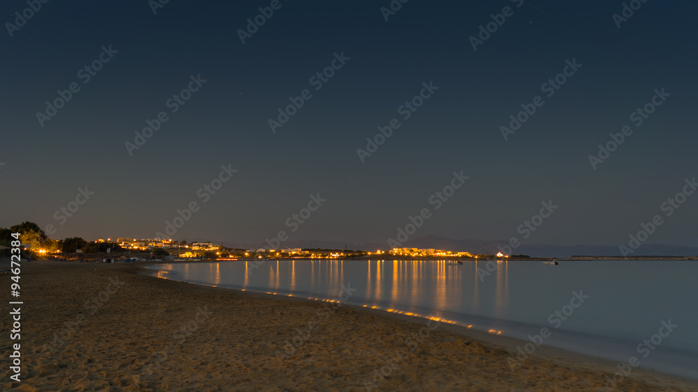 Night view of Golden beach or Xrisi Akti in Paros island in Greece.
