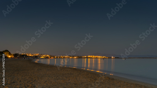 Night view of Golden beach or Xrisi Akti in Paros island in Greece. 